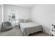Bedroom with a bed and a bean bag chair at 1330 Blazing Star Ln, Davenport, FL 33837