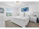 Spacious main bedroom with king-size bed and large window at 1330 Blazing Star Ln, Davenport, FL 33837