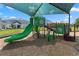 Community playground with a slide and climbing frame at 1330 Blazing Star Ln, Davenport, FL 33837