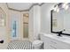 Cozy bathroom featuring patterned floors, modern fixtures, and a glass-doored shower at 840 Coach Lamp Ct, Sanford, FL 32771