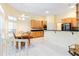 Bright kitchen and breakfast area with wood cabinets, breakfast bar, and plenty of natural light at 840 Coach Lamp Ct, Sanford, FL 32771