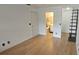Spacious bedroom with wood flooring, closet, ensuite bathroom and unique ladder feature to upper level at 6016 Westgate Dr # 301, Orlando, FL 32835