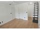 Bright living room featuring wood floors and neutral walls ready for your personal touch at 6016 Westgate Dr # 301, Orlando, FL 32835