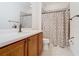 Bathroom boasts a shower/tub combo and modern vanity at 676 Villa Park Rd, Kissimmee, FL 34759