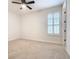 Bright bedroom featuring a window with shutters and ceiling fan at 676 Villa Park Rd, Kissimmee, FL 34759