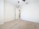 Spacious bedroom with carpeted floor and ceiling fan at 676 Villa Park Rd, Kissimmee, FL 34759