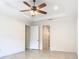 Bright bedroom featuring tile floors and ceiling fan at 676 Villa Park Rd, Kissimmee, FL 34759