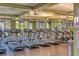 Bright fitness center with rows of modern treadmills and exercise equipment for a complete workout experience at 2201 Palm Tree Dr, Poinciana, FL 34759