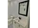 Stylish bathroom, featuring a white vanity and black accents at 2031 Balboa Way, Kissimmee, FL 34741