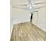 Spacious bedroom with ceiling fan and sliding barn door at 2031 Balboa Way, Kissimmee, FL 34741