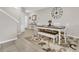 Dining area featuring a white wooden table and neutral decor at 3359 Bellezza Ct, Kissimmee, FL 34746