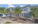 Charming two-story townhome features an attached garage, modern architecture, and well-maintained landscaping at 3359 Bellezza Ct, Kissimmee, FL 34746