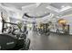 Spacious gym with modern fitness equipment and motivational decor for a healthy lifestyle at 6141 Metrowest E Blvd # 303, Orlando, FL 32835