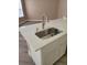 Close-up of modern kitchen sink with a sleek faucet and bright countertops at 2221 The Oaks Blvd, Kissimmee, FL 34746