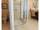 A bathroom featuring a glass shower enclosure, a toilet, tile flooring, and a vanity with a mirror at 1387 Lexington Ave, Davenport, FL 33837