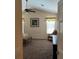 Neutral bedroom features carpet floors, a ceiling fan, and coordinated window valances and decorations at 1387 Lexington Ave, Davenport, FL 33837