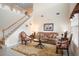 Living room with high ceilings and stairs at 1387 Lexington Ave, Davenport, FL 33837