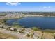 Community overview, featuring a lake and numerous houses at 507 Natural Bridge Ct, Apopka, FL 32703