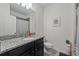 Bathroom features granite countertop and shower/tub combo at 507 Natural Bridge Ct, Apopka, FL 32703