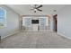 Spacious bedroom with built-in shelving and a large TV at 507 Natural Bridge Ct, Apopka, FL 32703