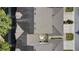 Aerial view of townhome roofs, patios, and surrounding landscape at 13712 Summerport Village Pkwy, Windermere, FL 34786