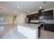 Kitchen featuring granite countertops and stainless appliances at 13712 Summerport Village Pkwy, Windermere, FL 34786