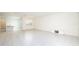Open-concept living room with tile floors, kitchen island, and bright lighting at 13712 Summerport Village Pkwy, Windermere, FL 34786