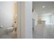 Efficiently designed half-bath for guests, located off the main living area for convenience and privacy at 13712 Summerport Village Pkwy, Windermere, FL 34786