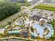Aerial view of community amenities featuring a lazy river, a pool, and a playground at 4348 Quote St, Kissimmee, FL 34746