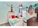 Themed bedroom with twin beds, nautical decor, and carpet flooring at 4348 Quote St, Kissimmee, FL 34746