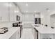 Modern kitchen features quartz countertops, stainless steel appliances, and subway tile backsplash at 4348 Quote St, Kissimmee, FL 34746