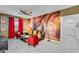 Living room featuring Harry Potter themed wall art, comfortable seating and contemporary decor at 4348 Quote St, Kissimmee, FL 34746