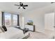 Spacious main bedroom with ample natural light, neutral decor, and a walk-in closet at 4348 Quote St, Kissimmee, FL 34746