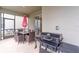 Outdoor patio area with a dining set and a grill on the lanai at 4348 Quote St, Kissimmee, FL 34746