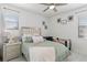 Tranquil bedroom featuring a soft color palette, comfortable bedding, and natural light at 8541 Spyglass Ln, Davenport, FL 33896