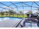 Relaxing screened pool and hot tub area at 520 Pinecrest Loop, Davenport, FL 33837