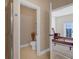 Ensuite bathroom with shower and toilet leading into the main bedroom at 2774 Bella Vista Dr, Davenport, FL 33897