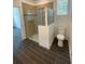 Bathroom with shower, toilet and tiled floor at 1730 Old Apopka Rd, Apopka, FL 32703