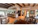 Stylish bar area with counter seating, modern lighting, and tables for dining at 1515 Carey Palm Cir, Kissimmee, FL 34747