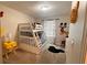 Playful bedroom with bunk beds and fun Mickey Mouse accents at 1515 Carey Palm Cir, Kissimmee, FL 34747