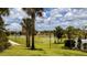Enjoy the community park with playground, sports court, and picturesque lake, perfect for outdoor activities and relaxation at 1515 Carey Palm Cir, Kissimmee, FL 34747