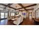 Inviting lobby featuring patterned chairs, beamed ceilings, and decorative lighting at 1515 Carey Palm Cir, Kissimmee, FL 34747