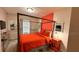 Stylish main bedroom with a four-poster bed, bright linens, and modern decor at 1515 Carey Palm Cir, Kissimmee, FL 34747