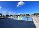 Community pool with water features and lounge area at 340 Elderberry Ct, Kissimmee, FL 34759