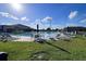Resort-style pool with lounge chairs and umbrellas at 340 Elderberry Ct, Kissimmee, FL 34759