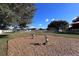 Playground with spring riders and wood chips at 340 Elderberry Ct, Kissimmee, FL 34759