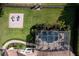 Aerial view of a home with a pool and cabana at 9210 Southern Breeze Dr, Orlando, FL 32836