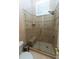 Bathroom with a large walk-in shower and tiled walls at 9210 Southern Breeze Dr, Orlando, FL 32836