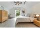 Spacious bedroom with a queen-size bed and private balcony at 9210 Southern Breeze Dr, Orlando, FL 32836