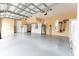Organized garage with ample storage and epoxy flooring at 9210 Southern Breeze Dr, Orlando, FL 32836